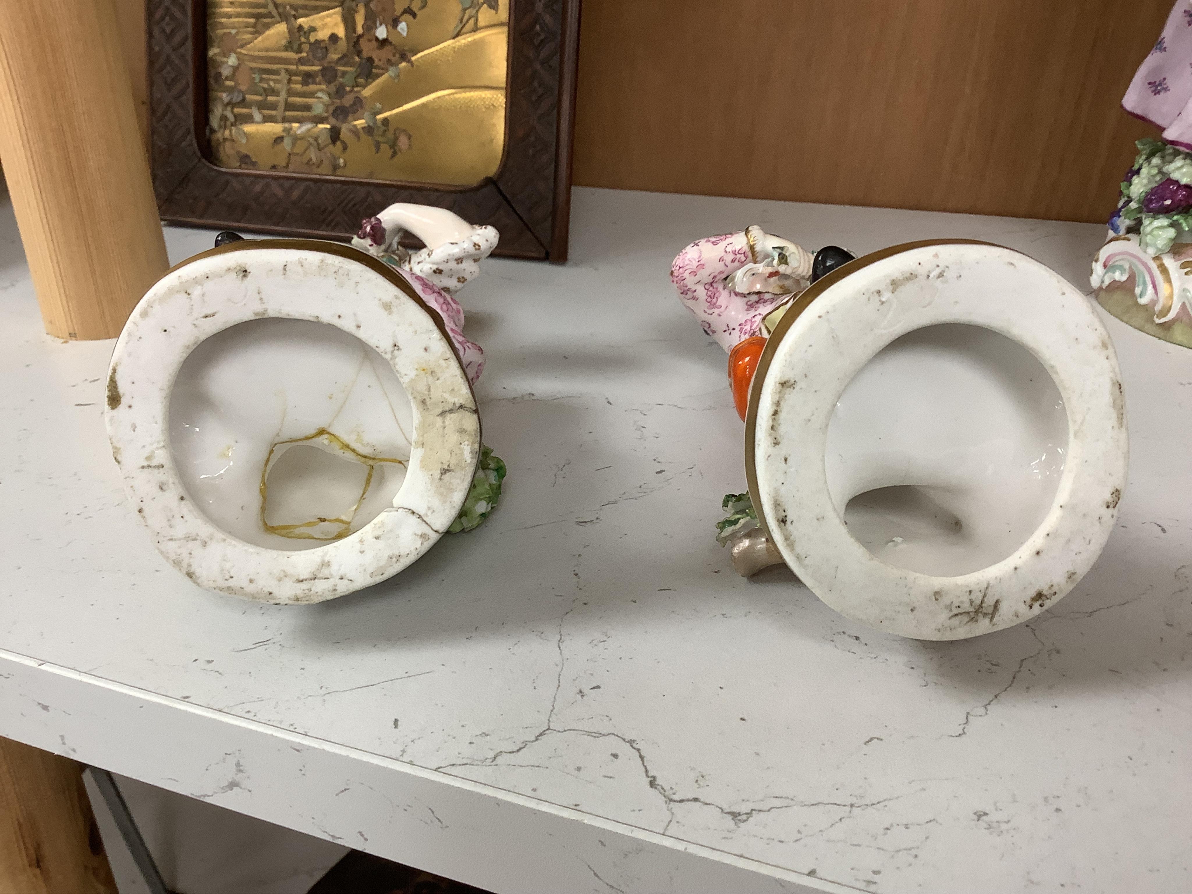 A Meissen style porcelain musical group, a figurine of a lady holding grapes and a two Derby figures of Summer and Autumn, c.1810-30, largest 24cm high